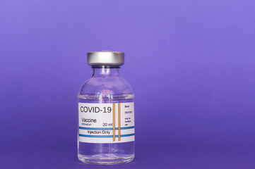 COVID-19 coronavirus vaccine isolated on purple background
