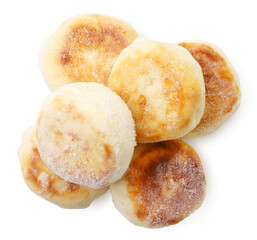Frozen cheese pancake on a white background, isolated semi-finished products. The view from top