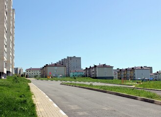 Fototapeta premium Courtyard with tall and small houses