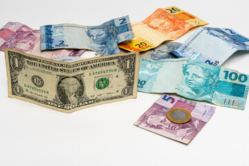 one dollar bill on Brazilian money notes, devaluation of Brazilian money