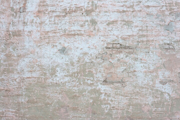 Fototapeta premium texture of old brick wall plaster on the wall of a street house
