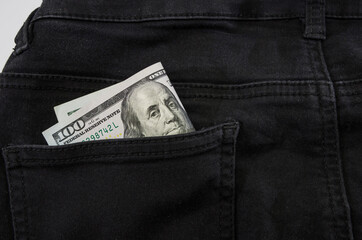 dollars in jeans pocket. Close-up.