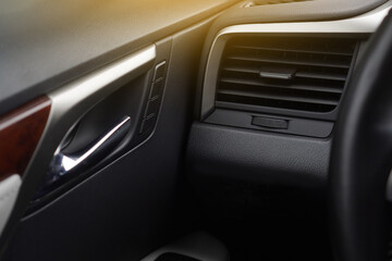 Obraz na płótnie Canvas Air vent panel grille for conditioning a modern car