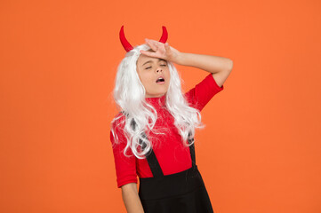 sick and tired. tired kid has long white hair wig. childhood happiness. teen girl ready to...