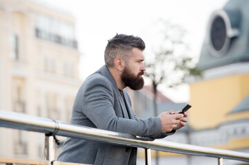 Stay in touch. Serious hipster text sms in mobile phone. Social media. Direct message. Instant...