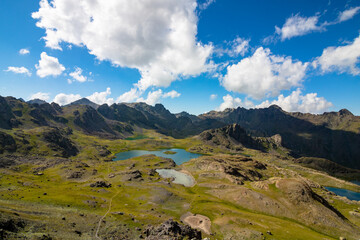 Glacial lakes on the top of mountains. Landscape of the mountain top and cloudy sky. Yedigoller in Ispir Erzurum Turkey.