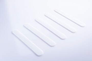 medical disposable spatula on white background top view