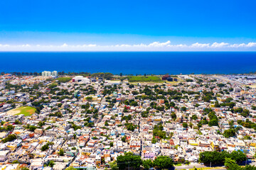 Aerial drone view of Santo Domingo city with caribbean sea. The capital of Dominican Republic