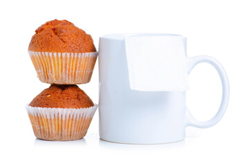 muffins and cup mug of tea on white background isolation