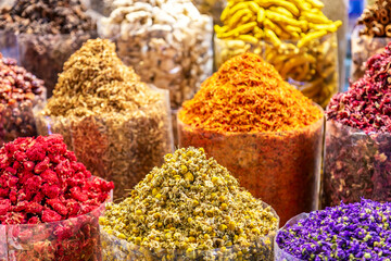 Colorful spices at the arab street market. Dubai Spice Souk in United Arab Emirates.