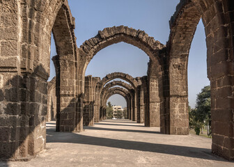 Fototapeta na wymiar Bara Kaman is the unfinished mausoleum of Ali Adil Shah II in Bijapur, Karnataka in India
