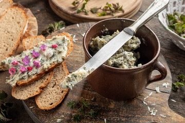 Nettle butter on a tip of a knife