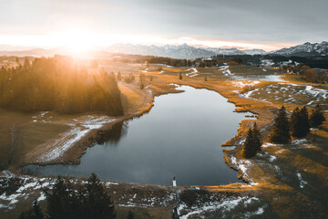 Lake in front of the alps