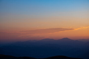 Silhouette of hills at sunset