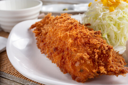 A Closeup View Of A Fish Katsu Plate.