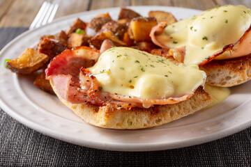 A view of a plate of eggs Benedict.