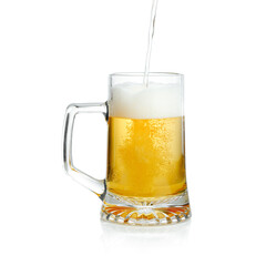 pouring a mug with fresh draft beer, isolated on white