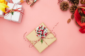 Merry Christmas gift wrapping step by step, decorations on pink background, copy space