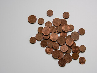 a handful of small coins European cents