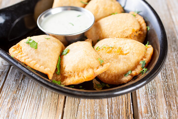 A view of a plate of empanadas.