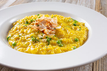A view of a plate of saffron risotto.