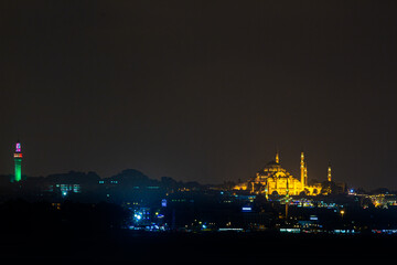 Suleymaniye Mosque and Beyazit Fire Tower in Istanbul at night