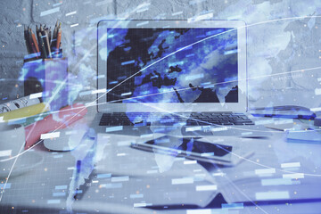 Multi exposure of desktop computer and technology theme hologram. Concept of software development.