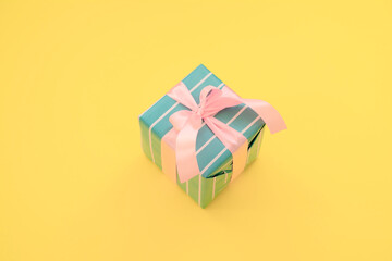 Gift box with a pink ribbon