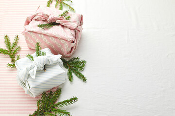 Christmas eco-friendly gift wrap in traditional japanese furoshiki style, eco-friendly gift wrap and Zero Wast concept