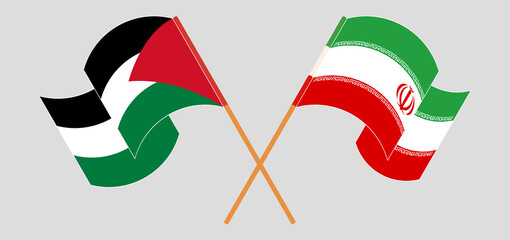 Crossed and waving flags of Palestine and Iran