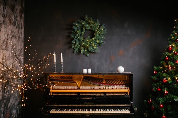New Year 2021 interior with candles, bulbs and bokeh. Room decorated to christmas celebration....
