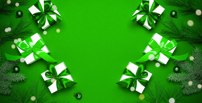 Happy 2021. White gift box with emerald ribbon, New Year balls and sparkling lights in Christmas composition on dark green background for greeting card. Christmas, winter, new year concept. - Powered by Adobe