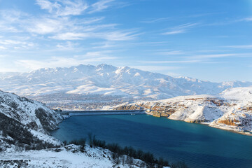 amazing winter landscape of Charvak reservoir in winter Uzbekistan