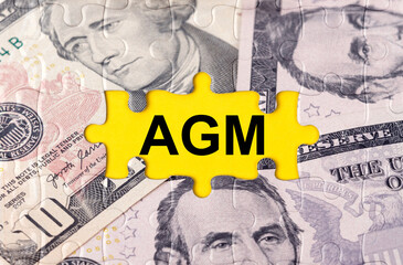 Puzzle with the image of dollars in the center of the inscription -AGM