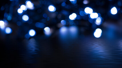 Light effect on a dark background, bright lights, blur, bokeh. Reflection of neon light in water.