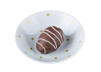 Chocolate truffles with strawberry filling isolated on white background. Closeup photography.