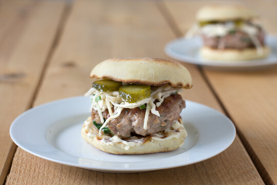 pork burgers with sweet and spicy slaw, english muffin