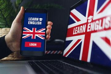 Learning foreign languages online. Woman holding smartphone with app for studying English on...