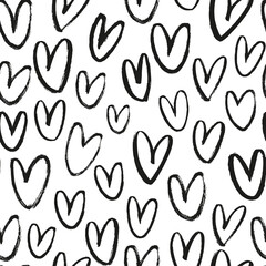 Vector seamless heart pattern. Valentine's Day ornament. Hand drawn abstract seamless background with grunge heart. Black and white vector wallpaper. Ornament for wrapping paper, gift wrap, print