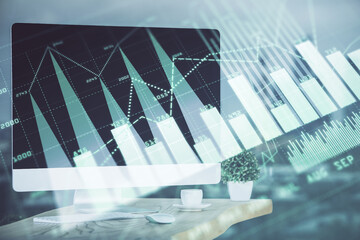 Forex Chart hologram on table with computer background. Double exposure. Concept of financial markets.