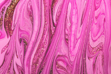 Abstract sparkling pink background. Close up nail polish texture.