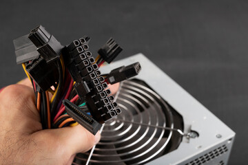 Hand held plugs for powering PC components. Components of the computer power supply.