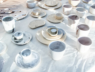 black and white ceramic tableware on white canvas