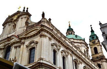 Fototapeta na wymiar Prague's Baroque St Nicholas Church in the Mala Strana or lesser town