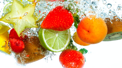 Freeze Motion Shot of Fresh Fruits Falling Into Water Isolated on White Background.