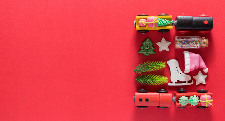 Layout with new year christmas toy trains, fir trees, toys - new year knolling with copy space