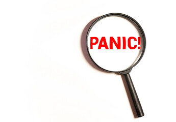 a magnifying glass isolated with text panic.