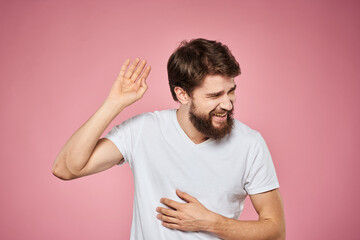 cheerful bearded man white t-shirt emotions cropped view pink background