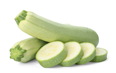 Cut and whole green ripe zucchinis on white background