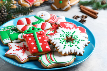 Fototapeta na wymiar Delicious Christmas cookies on light marble table, closeup